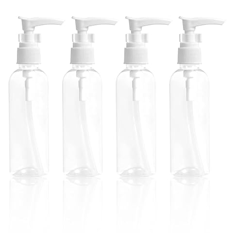 Quatre flacons de voyage transparents de 100 ml avec fond blanc et pompe à pression