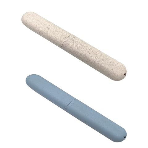 Deux étuis de protection pour brosse à dents en plastique, beige et bleu, posés côte à côte.