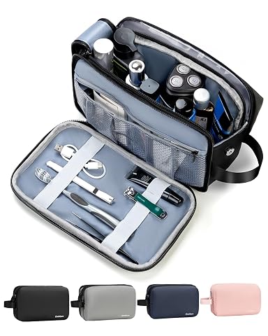 Trousse de toilette de voyage noire ouverte, avec poignée, poches intérieures et produits rangés
