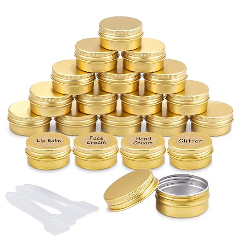 Vingt pots de voyage en aluminium doré avec quatre spatules, des étiquettes et une boîte de rangement