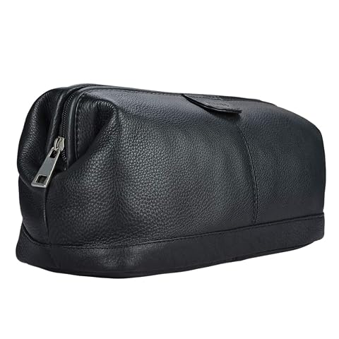 Trousse de toilette Stilord Laurin en cuir noir, posée dans un décor de voyage sobre